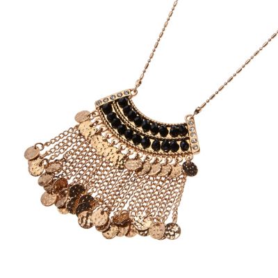 Gold tone dangly long necklace